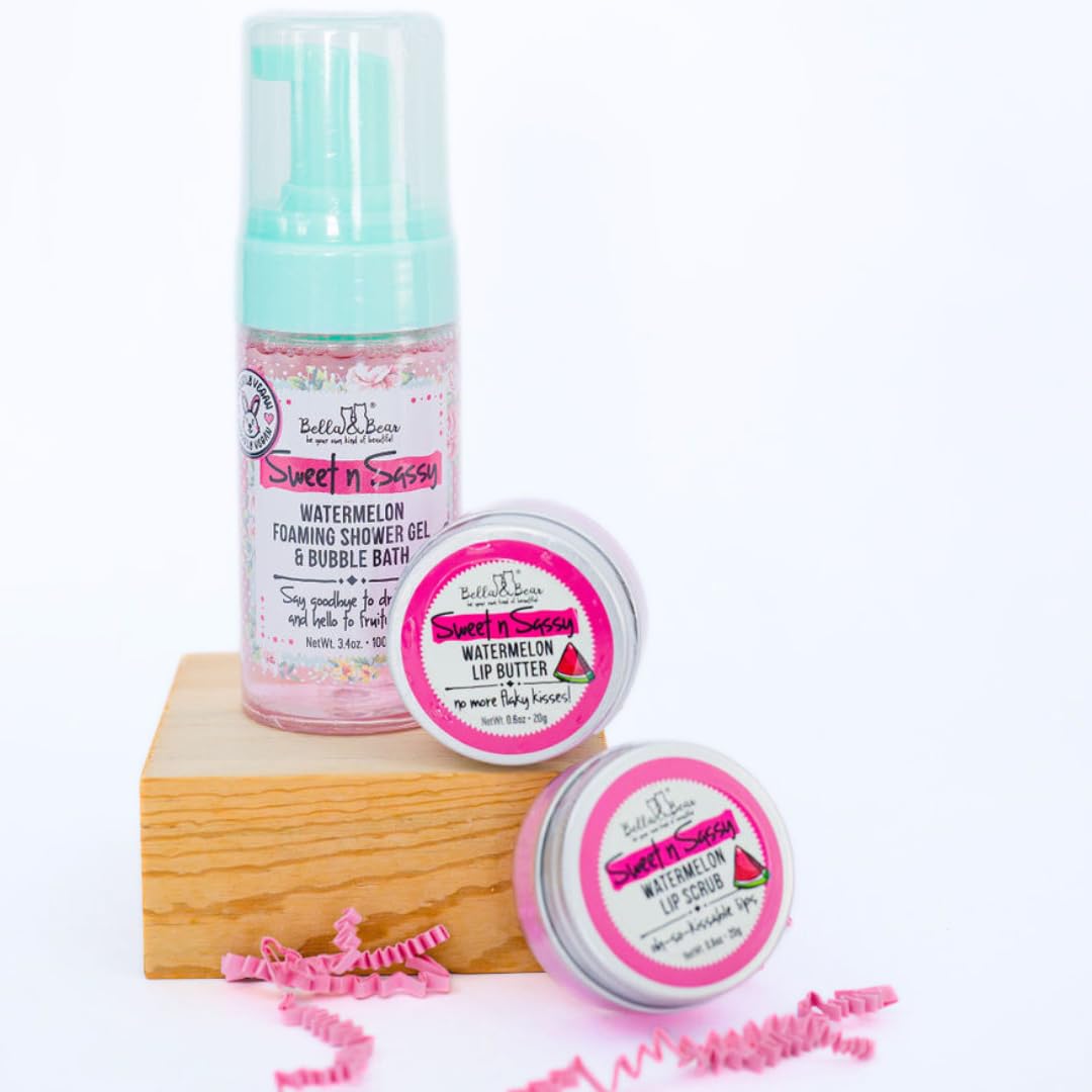 Travel-sized Bella and Bear lip scrub packaging on vanity