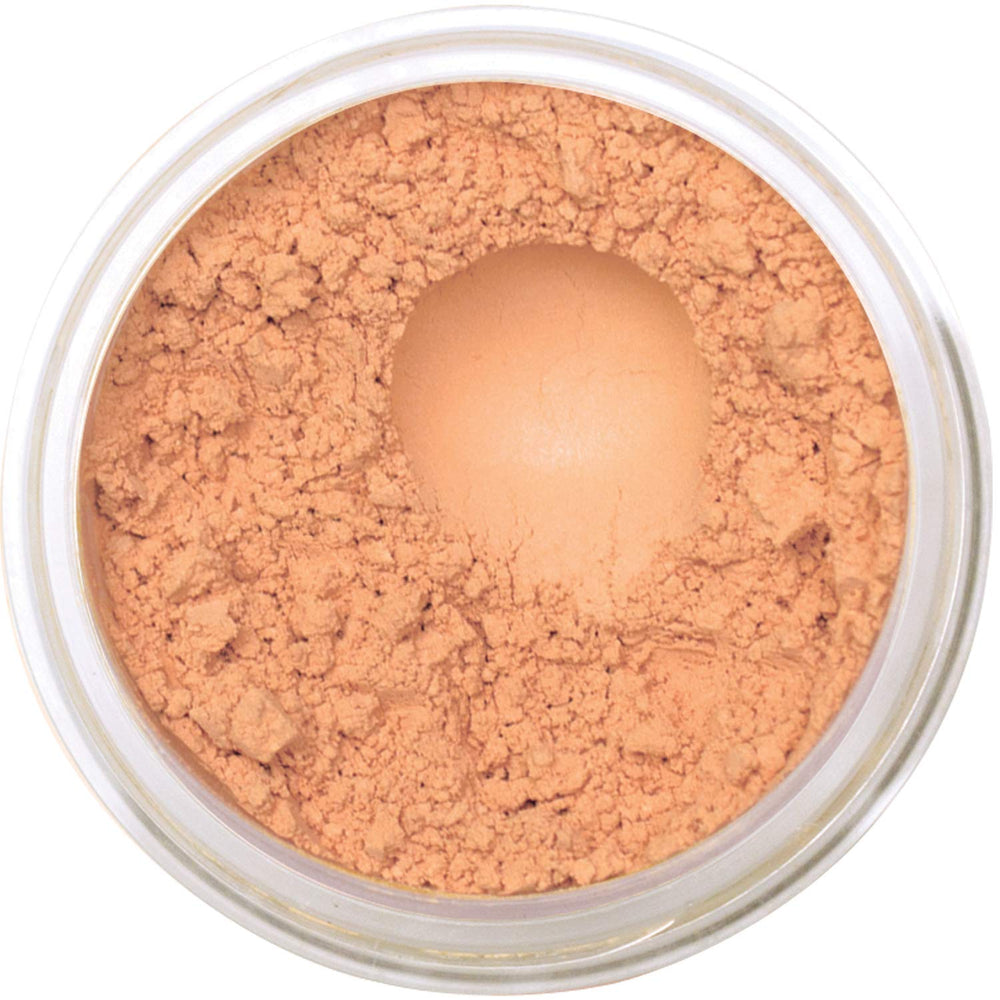 Bellaterra Mineral Foundation Latte compact demonstrates buildable coverage for a natural look.