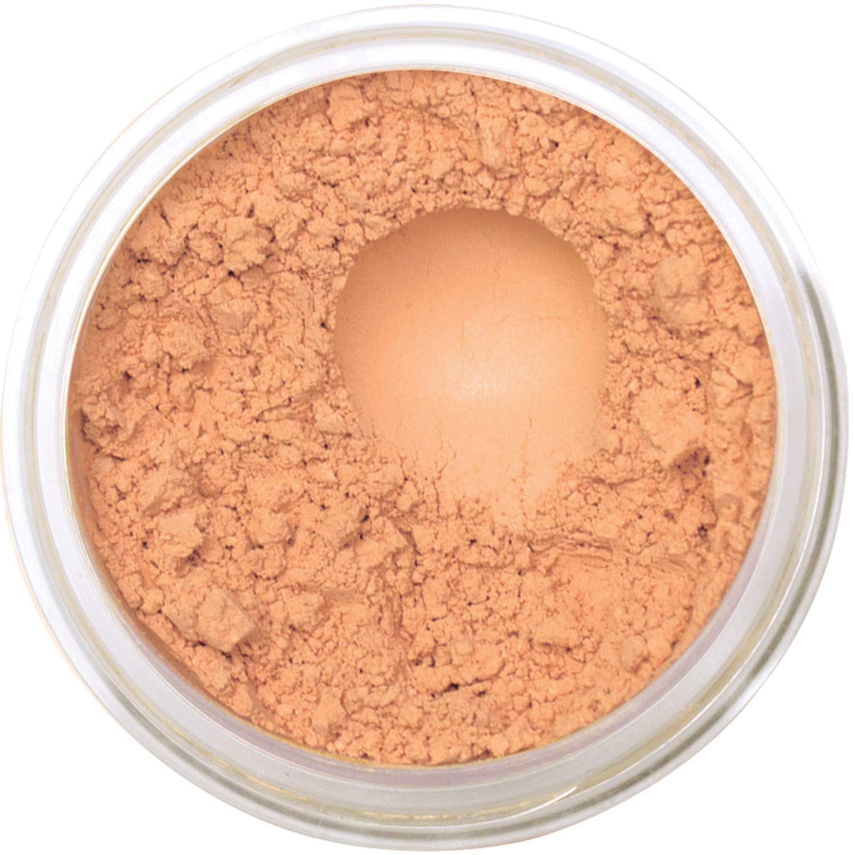 Bellaterra Mineral Foundation Latte compact demonstrates buildable coverage for a natural look.