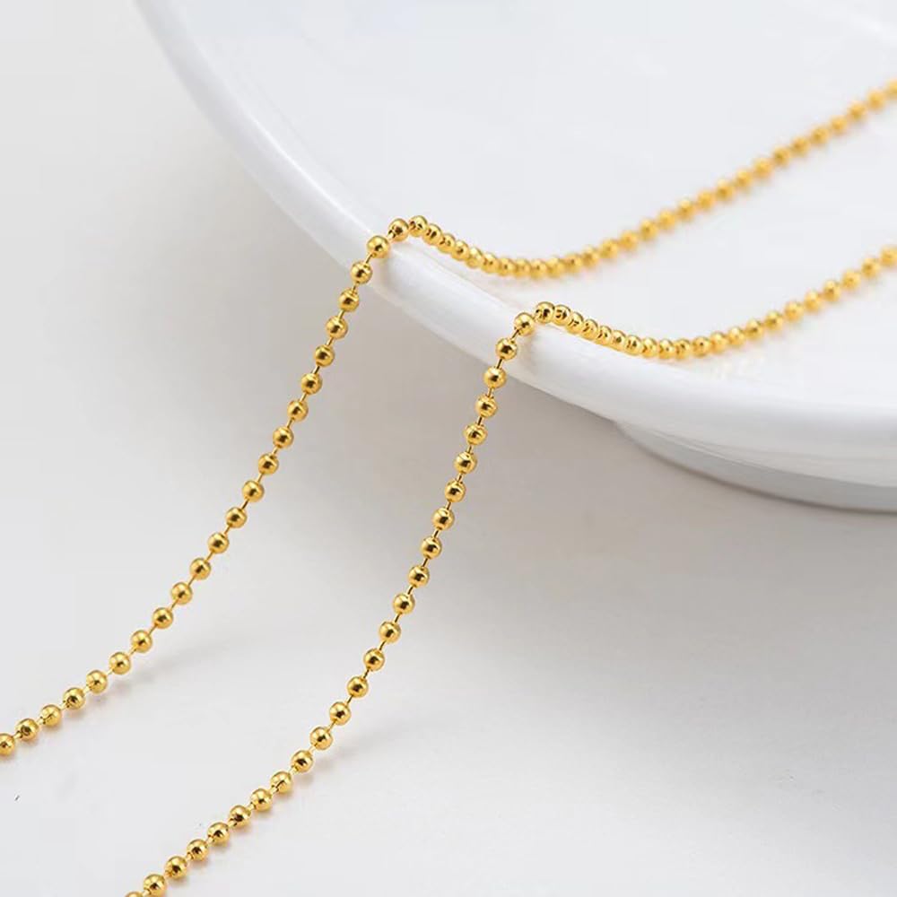 Bellecrey gold and silver nail charm beads for elegant embellishments.