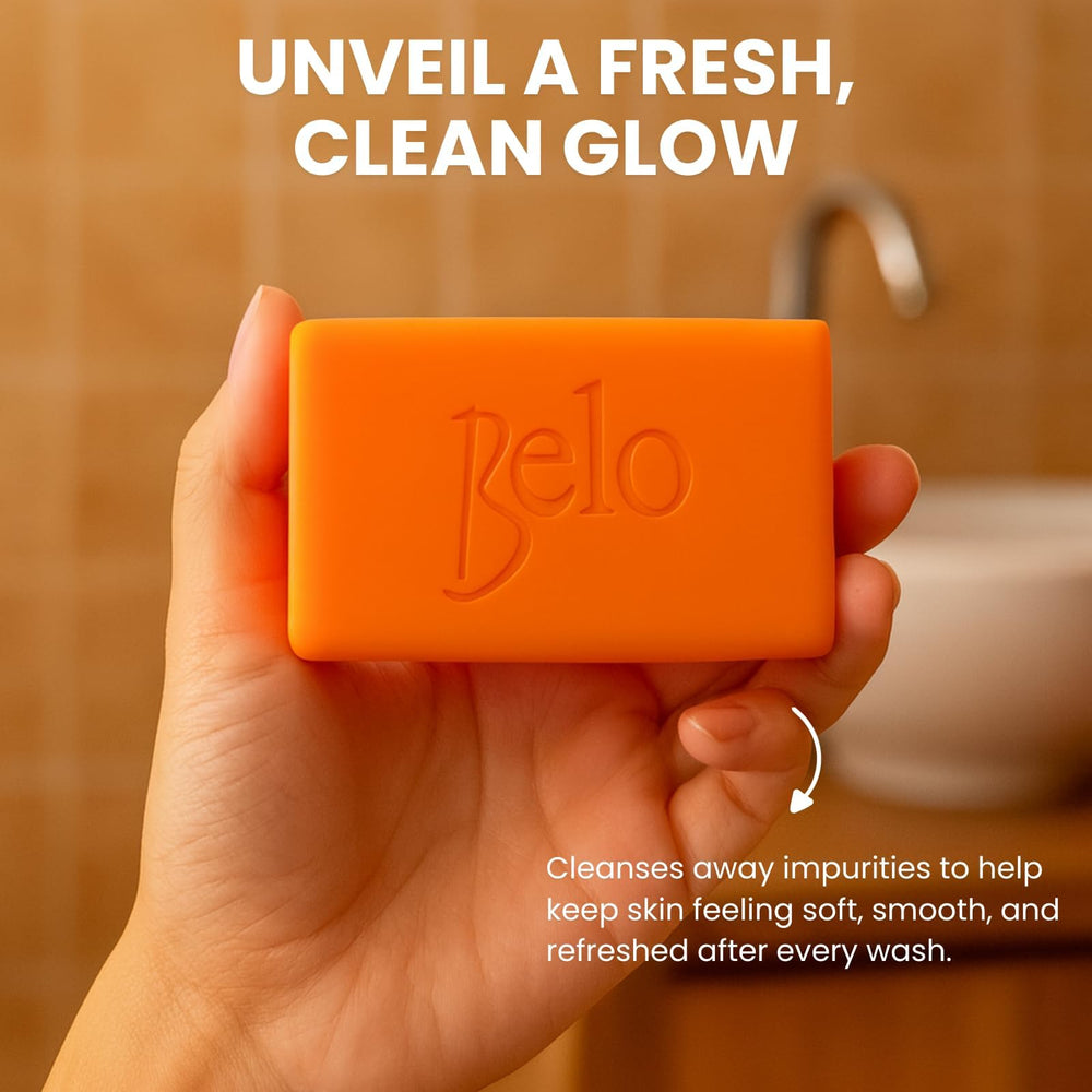 Belo Essentials cleansing bar with water droplets for refreshing, hydrating wash.