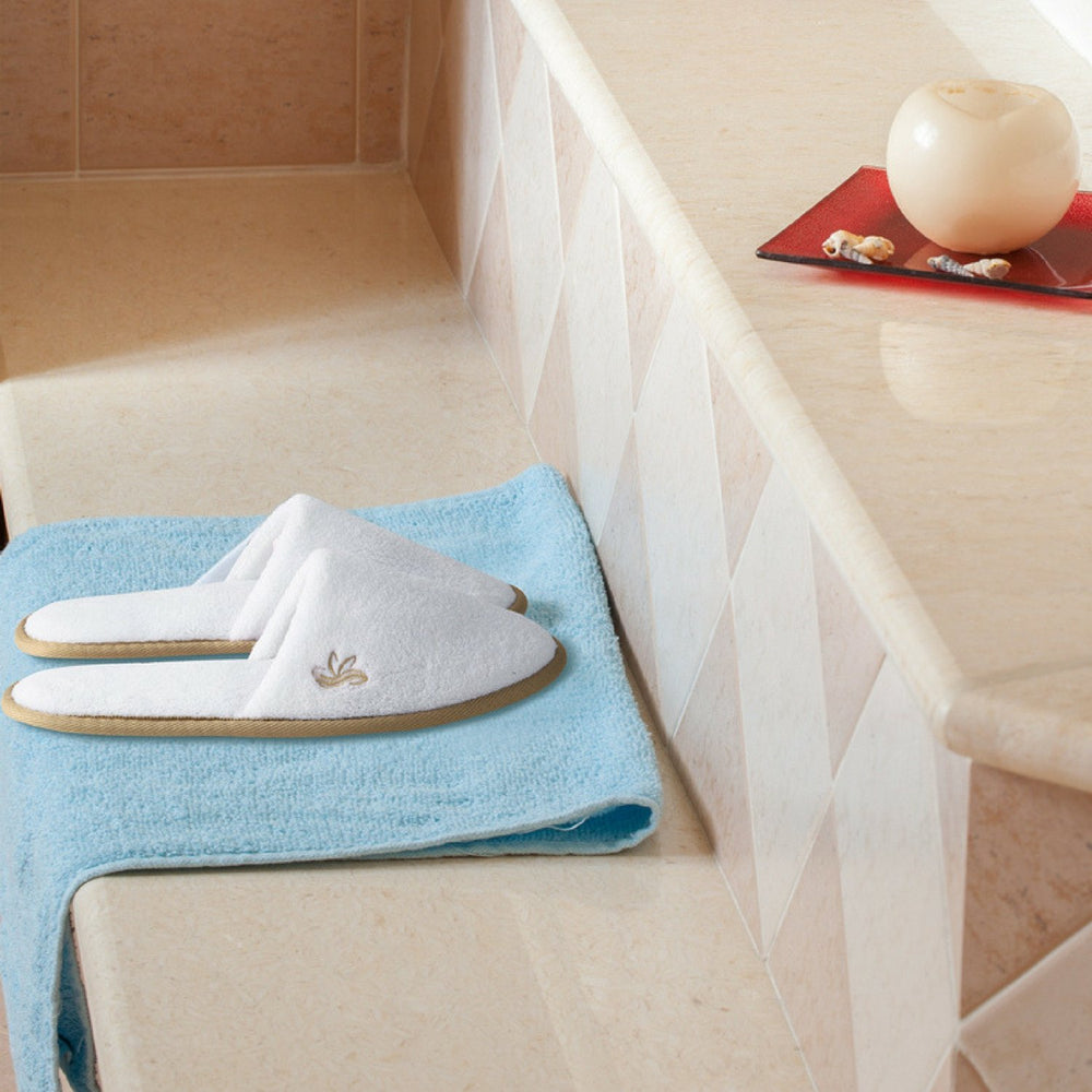 BERGMAN KELLY individually wrapped spa slippers for hygiene