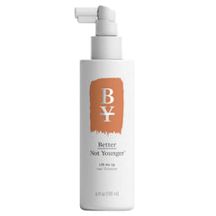 Better Not Younger hair thickener bottle pour showing root lift and fullness.