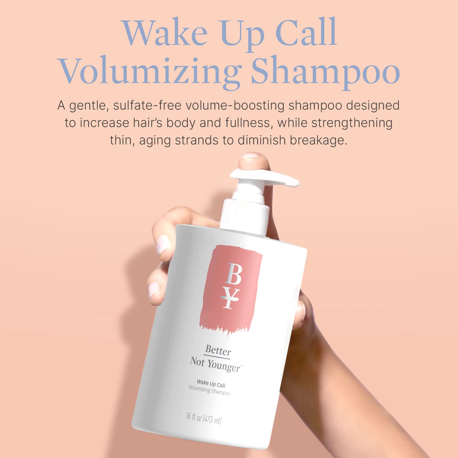Wake Up Call shampoo lather shown on hand with rich foam.