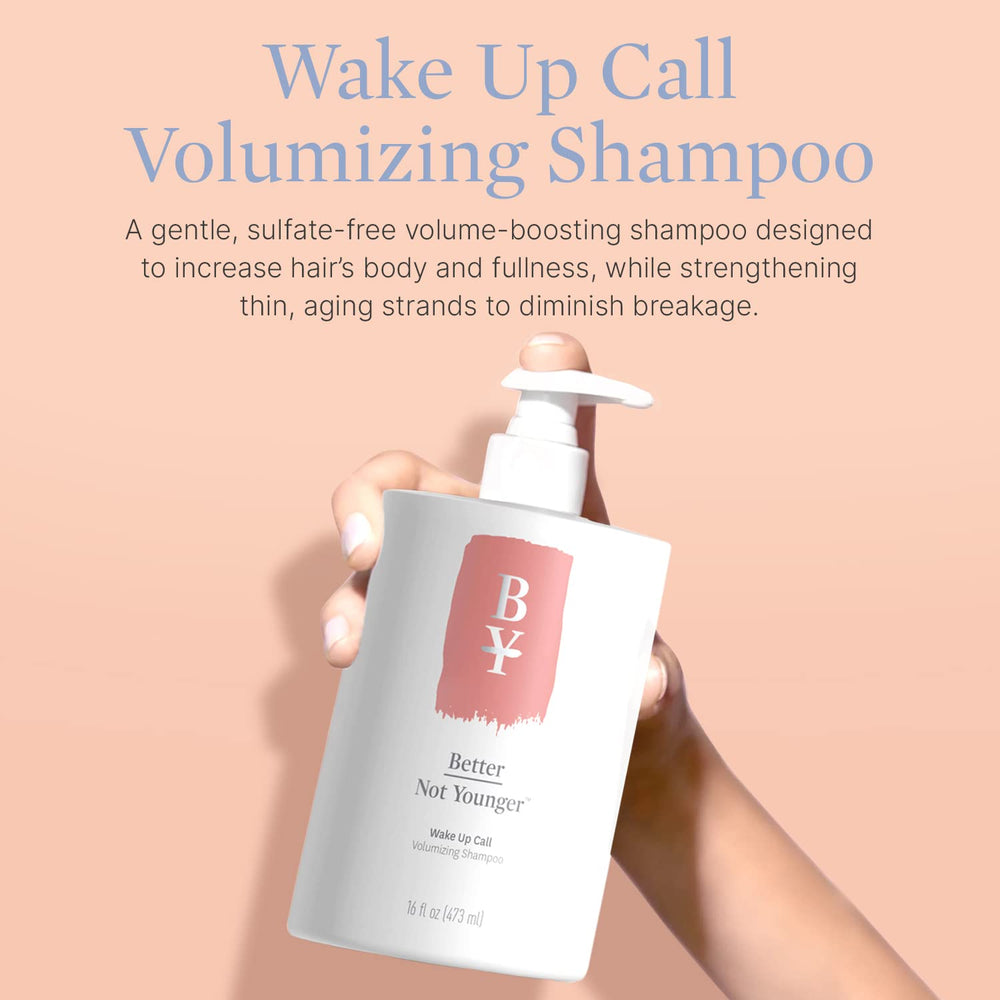 Wake Up Call shampoo lather shown on hand with rich foam.