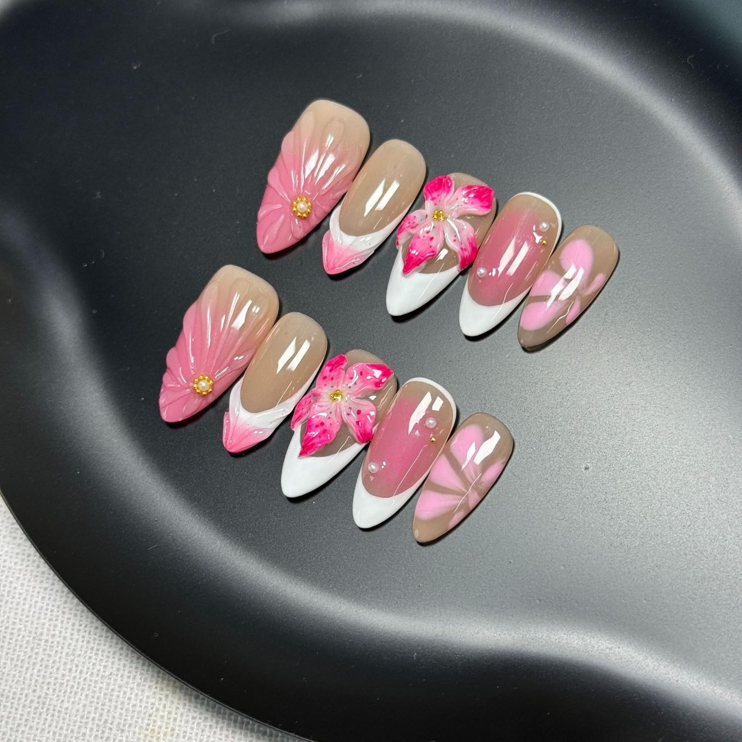 BHOOKA 3D water ripple nails with luxe texture and pink gradient finish.