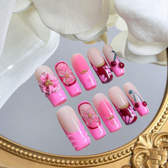BHOOKA coffin shaped nails show cherry embossing for festive looks
