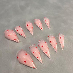 BHOOKA curved stiletto full-cover nails in pink offer dramatic, easy-to-apply style