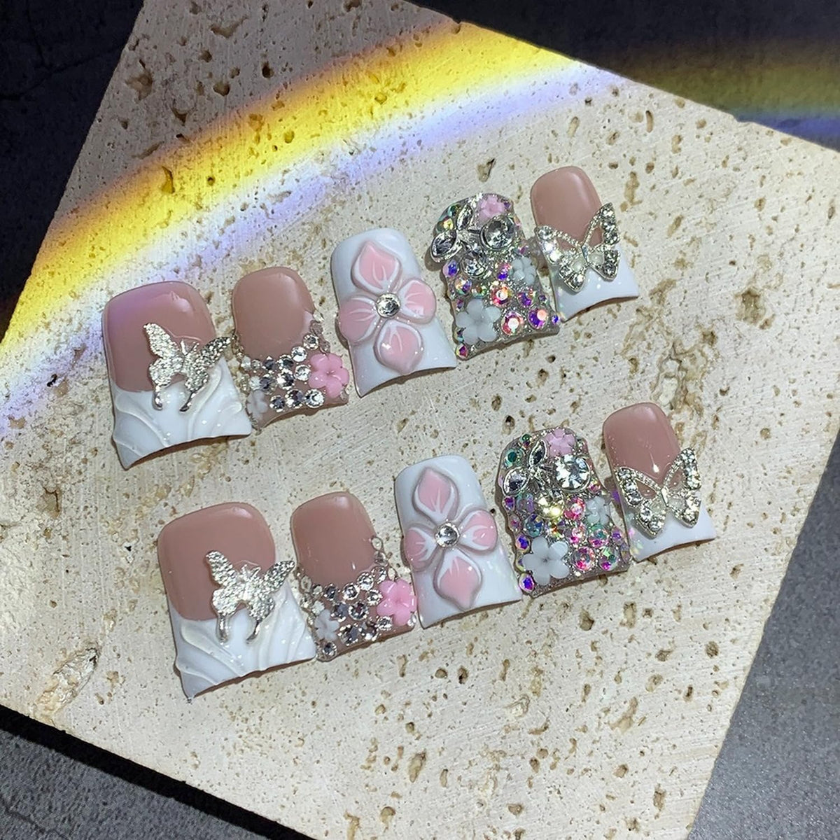 BHOOKA duck nails with 3D flowers offer glam for parties.