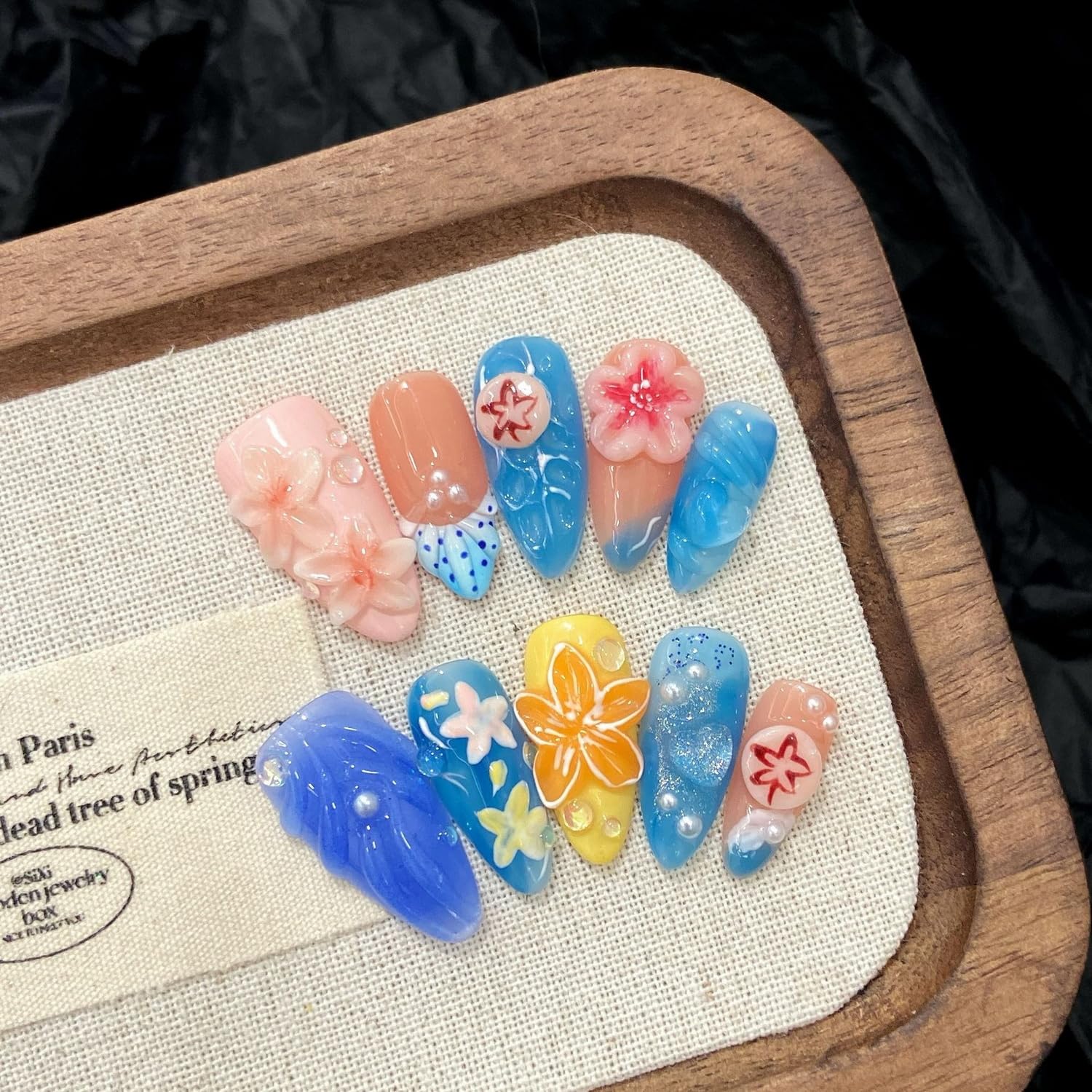 BHOOKA starfish embossed nails provide shimmering texture for seaside looks
