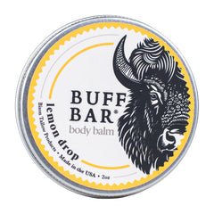Big Crazy Buffalo Buff Bar Lemon Drop tin—hydrating citrus-scented balm for dry skin.