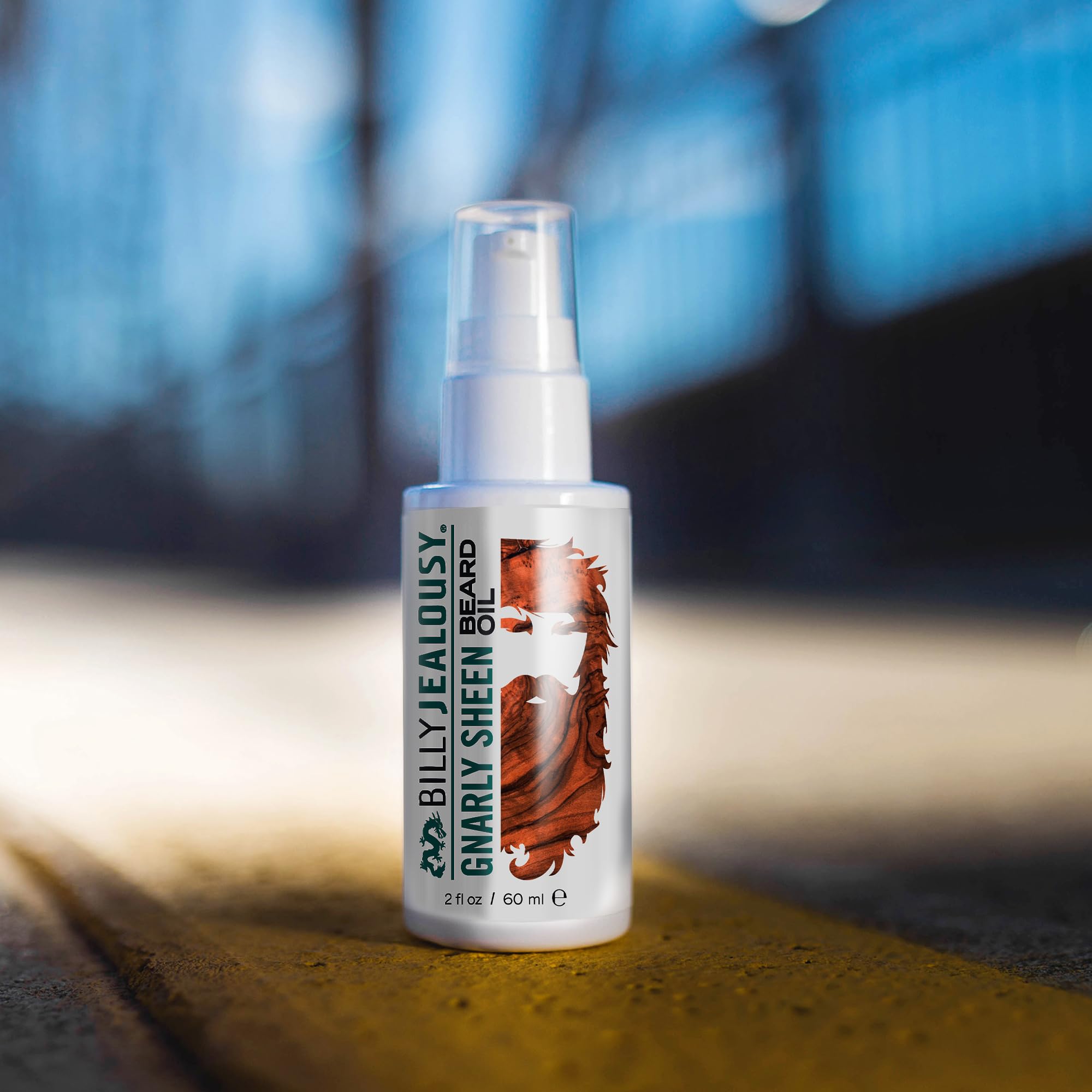 Billy Jealousy Beard Oil on beard strands delivering soft, manageable hair.