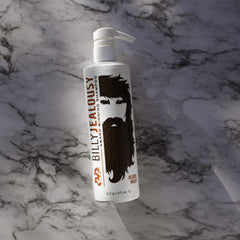 Billy Jealousy Beard Wash label closeup highlights natural ingredients and fragrance.