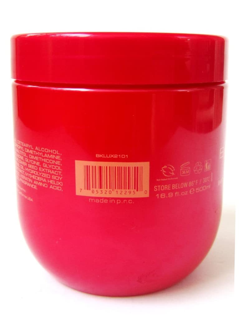 Towel-dried hair with Bio PureOils Keratin Luxury Masque for silky finish