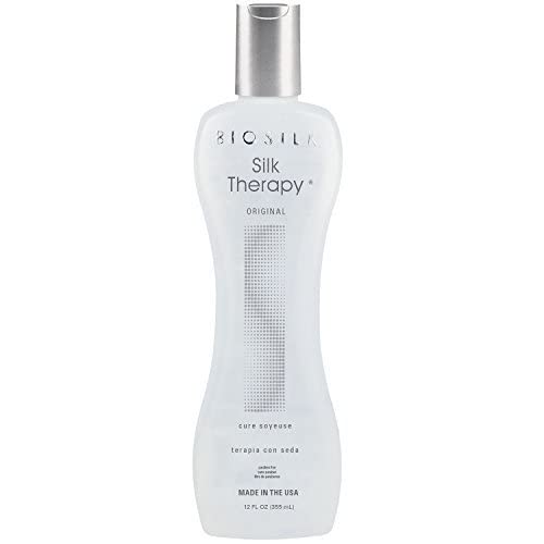 BioSilk Silk Therapy Original Cure Conditioner creamy formula on palm for easy application.