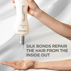 BioSilk Silk Therapy Shampoo bottle on shower shelf for all hair types