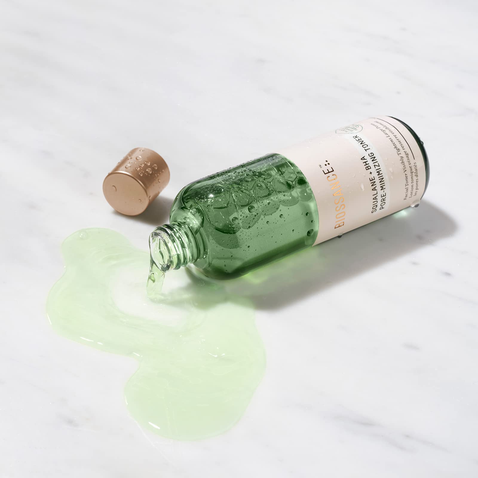 BIOSSANCE Squalane + BHA Toner texture swatch demonstrates smooth, refined skin