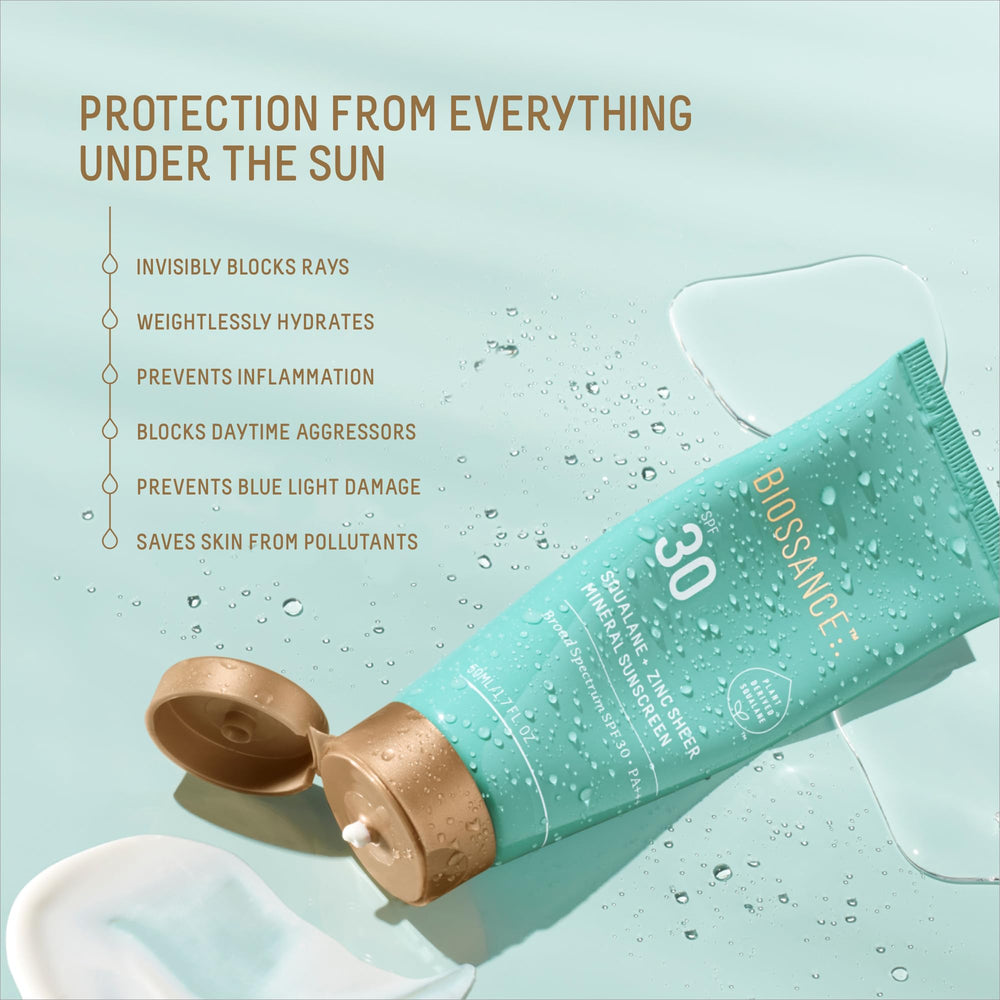 BIOSSANCE Squalane + Zinc sunscreen being spread for sheer coverage without chalkiness.