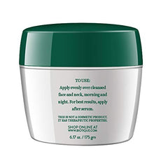Biotique saffron youth cream texture on fingertips demonstrating smooth application.