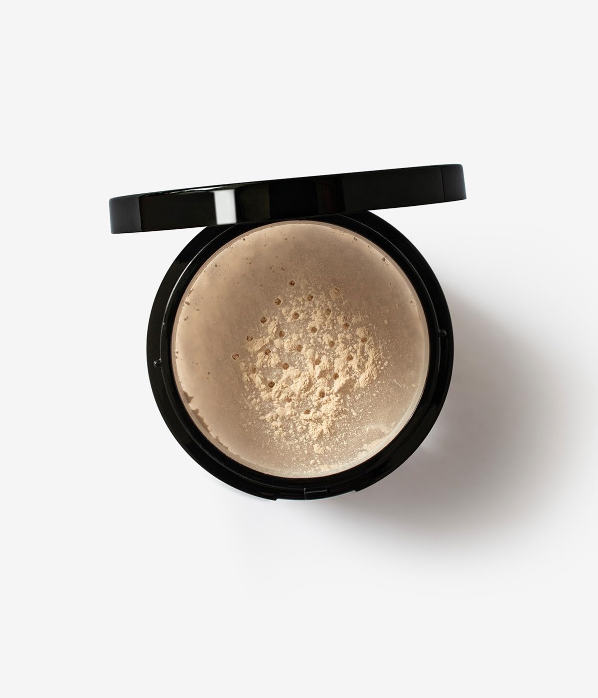 Biotulin Hydrolon powder on skin showing a radiant finish.