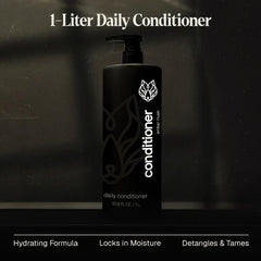 Application shot of Black Wolf conditioner for smooth detangling.