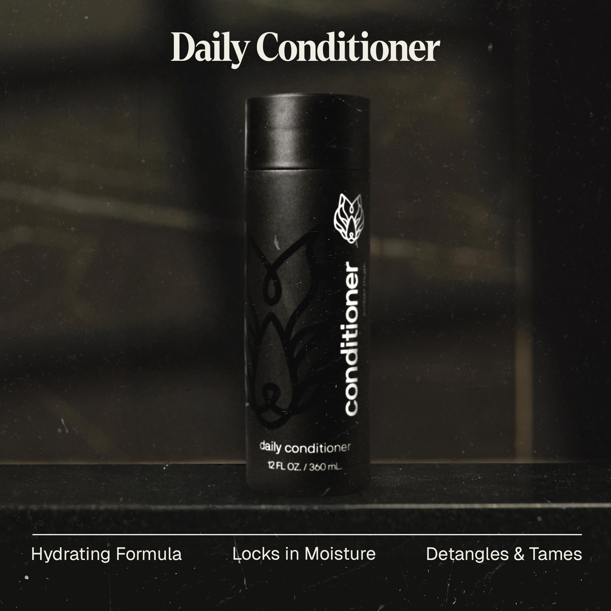 Close-up of Black Wolf conditioner pouring to detangle wet hair.