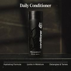 Close-up of Black Wolf conditioner pouring to detangle wet hair.