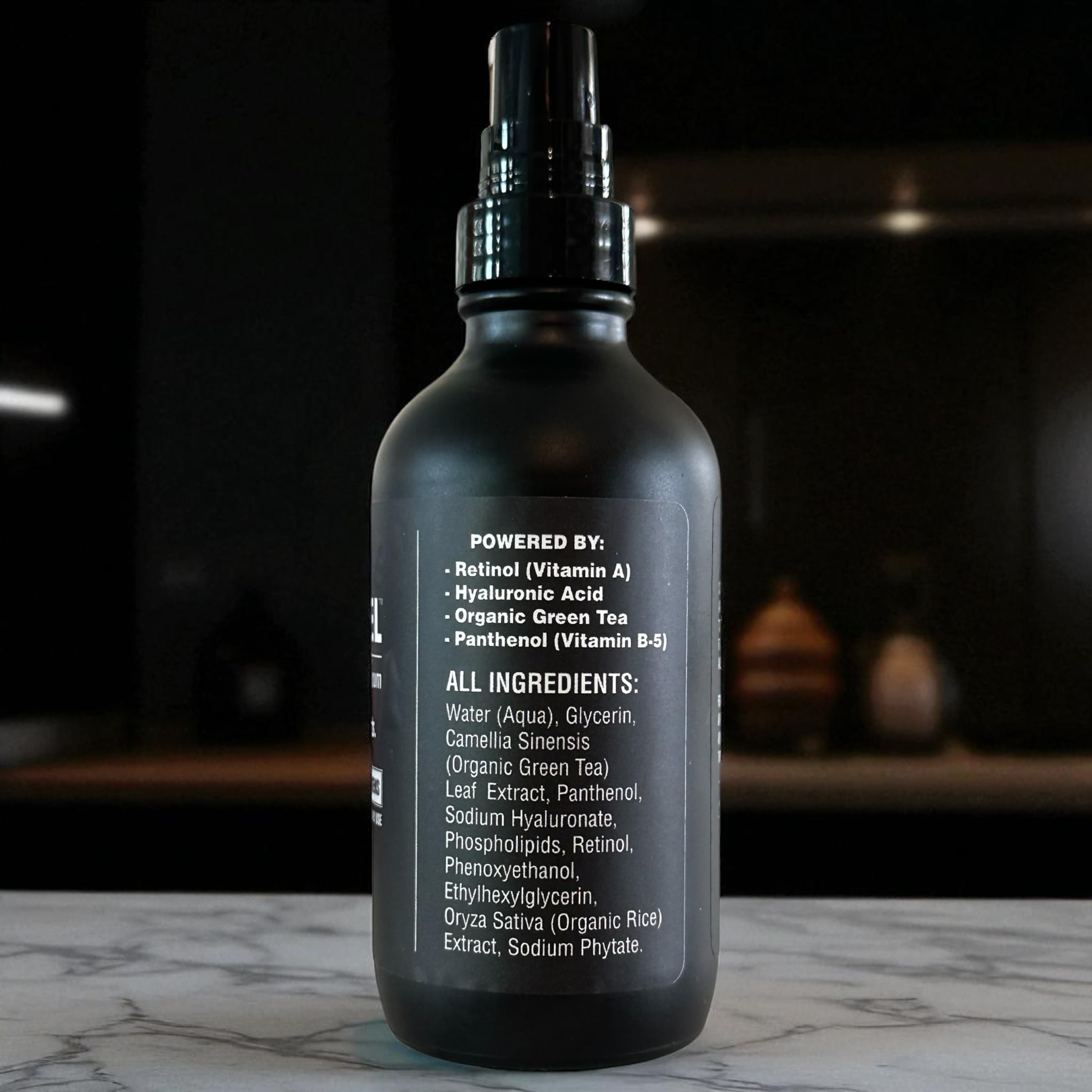BLACKSTEEL serum label detail highlighting retinol and hyaluronic acid ingredients