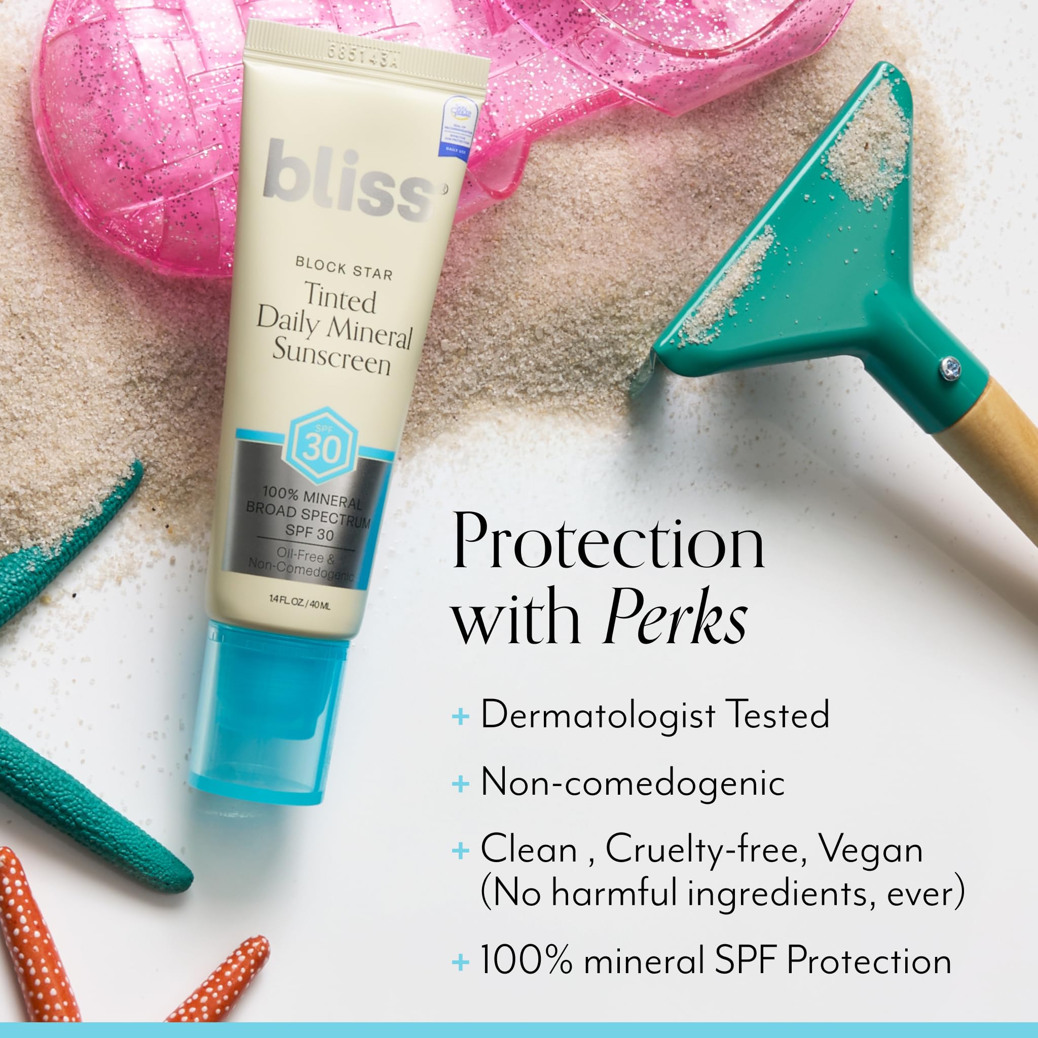 Bliss Block Star cream texture shown on fingertip.