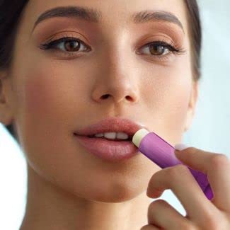 Six-pack display of Blistex Lip Infusions Revive, ideal for travel or family use.