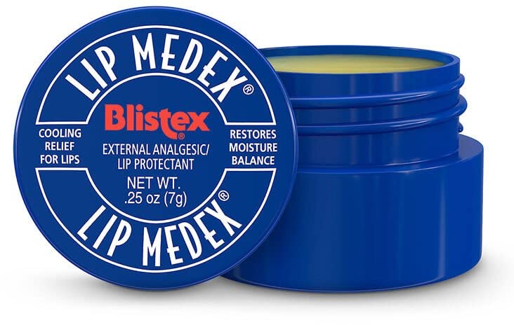 Close-up of Blistex Lip Medex balm texture on lips for cooling relief.