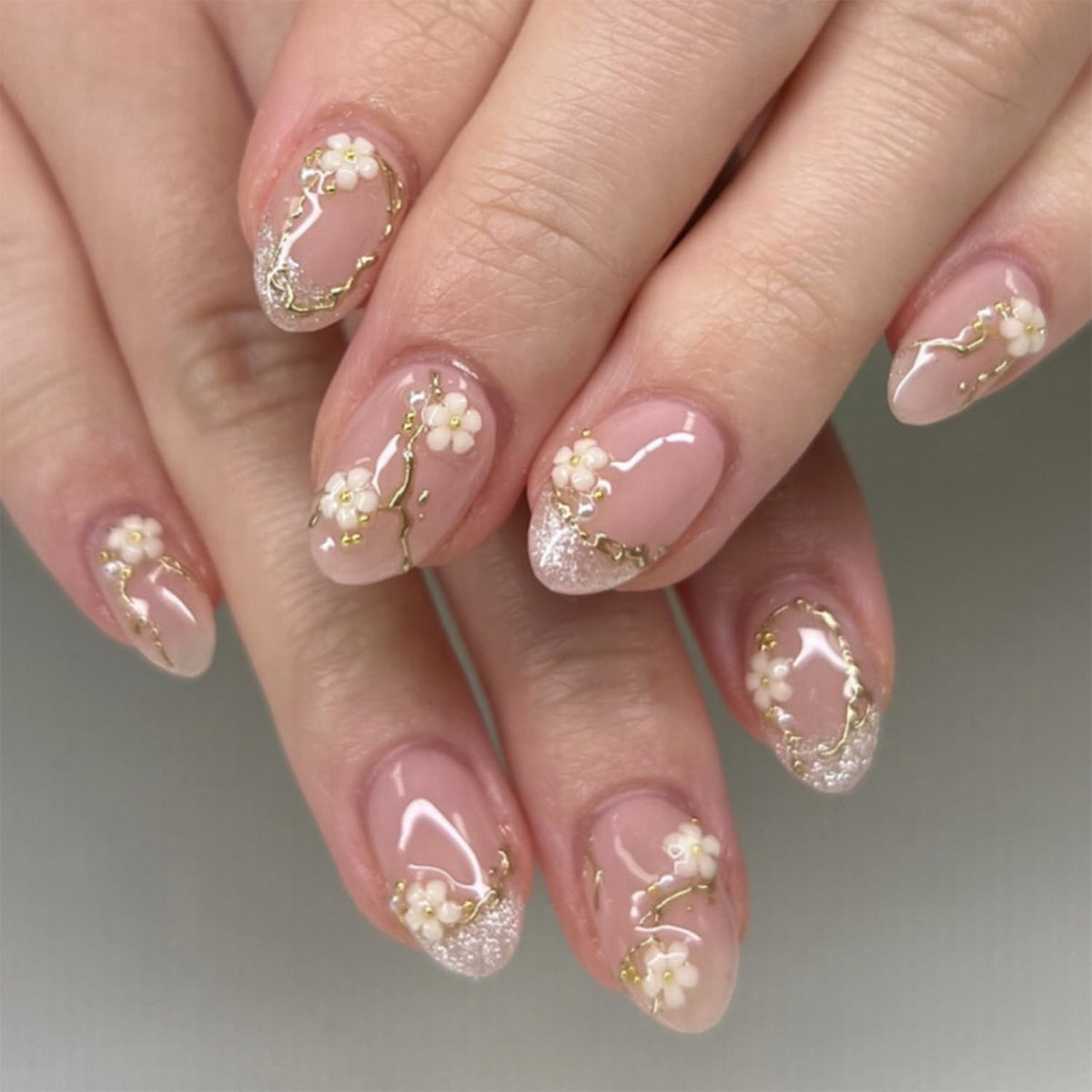 Bloazife 24-piece flower press-on nails kit for quick at-home manicures.