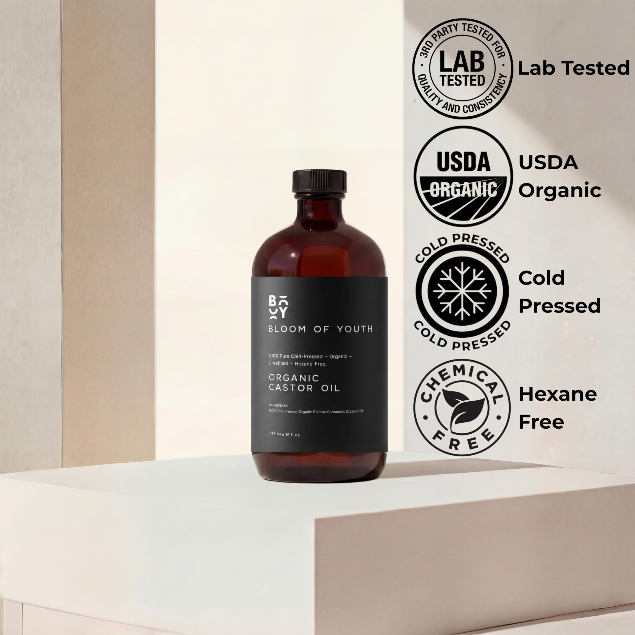 Bloom of Youth castor oil made in the USA in dark glass.
