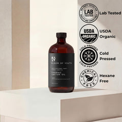 Bloom of Youth castor oil made in the USA in dark glass.