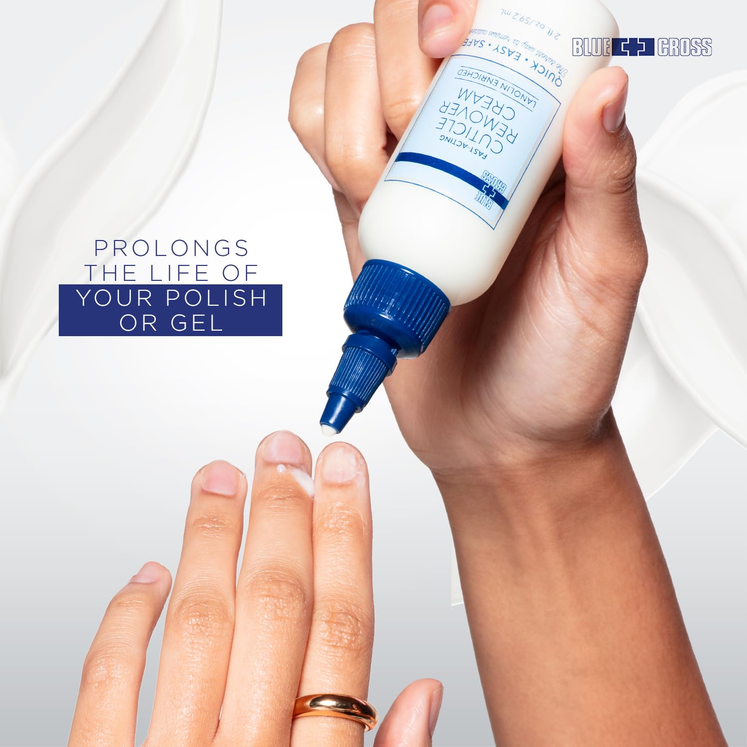 Blue Cross Cuticle Remover Cream with lanolin nourishes nail beds.