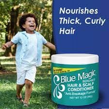 Blue Magic Bergamot bottle on bathroom shelf for everyday hair health.