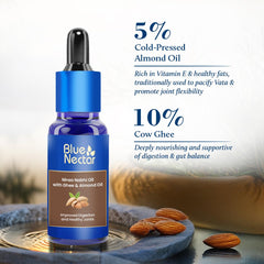 Blue Nectar Nabhi Oil blends 21 herbs with ghee and almond oil for holistic care.