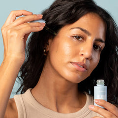 Blume Meltdown on face shows easy application and spot treatment capability.