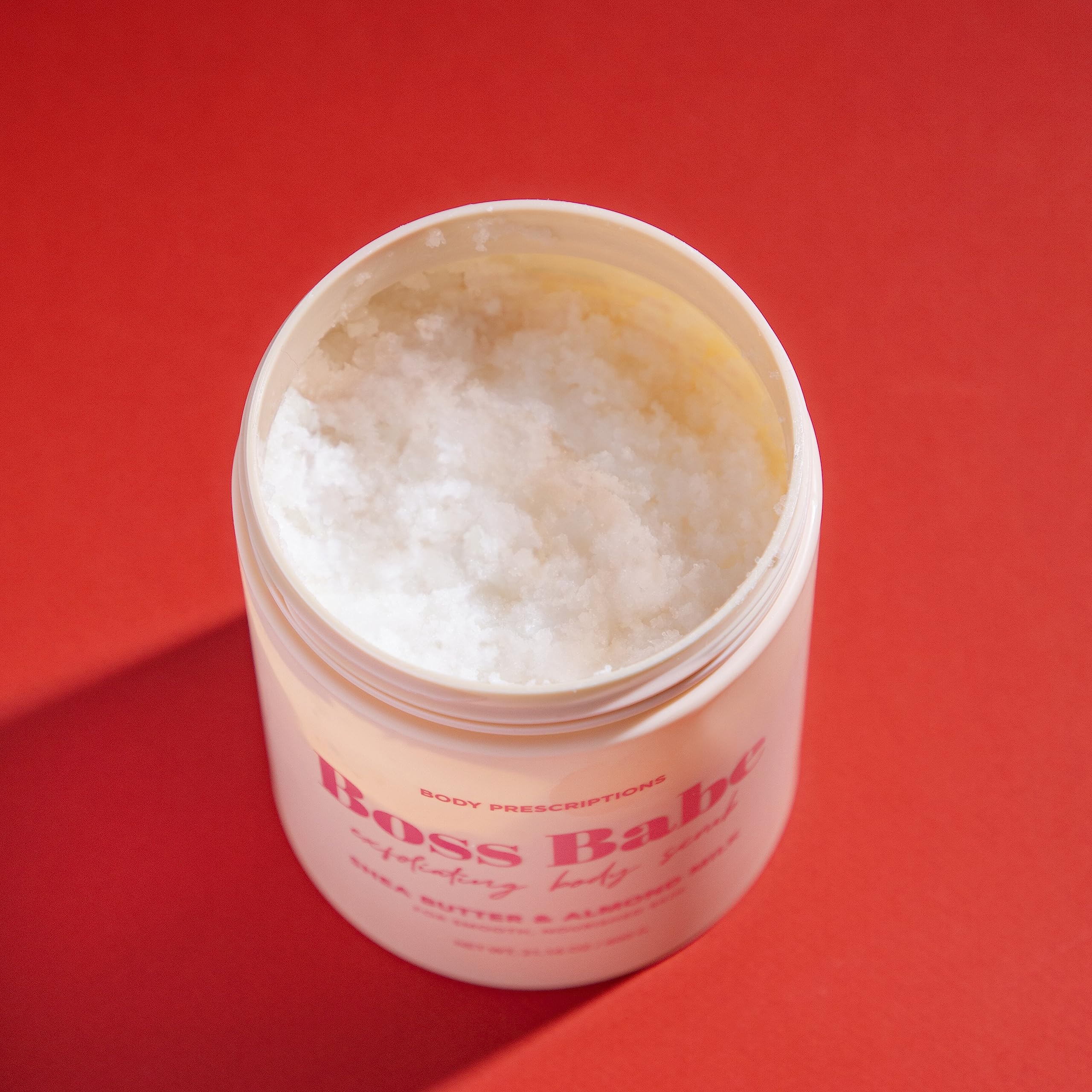 Ingredients image highlights shea butter and almond milk in Body Prescriptions scrub