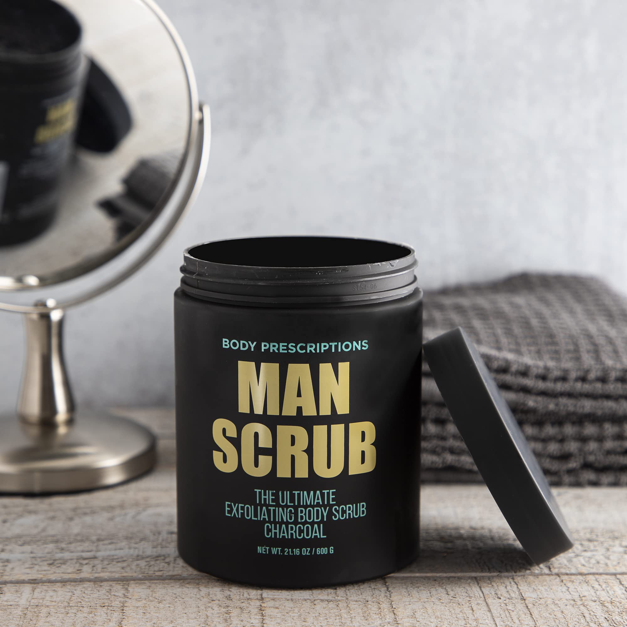 Application of Body Prescriptions Men’s Exfoliating Scrub on skin during routine