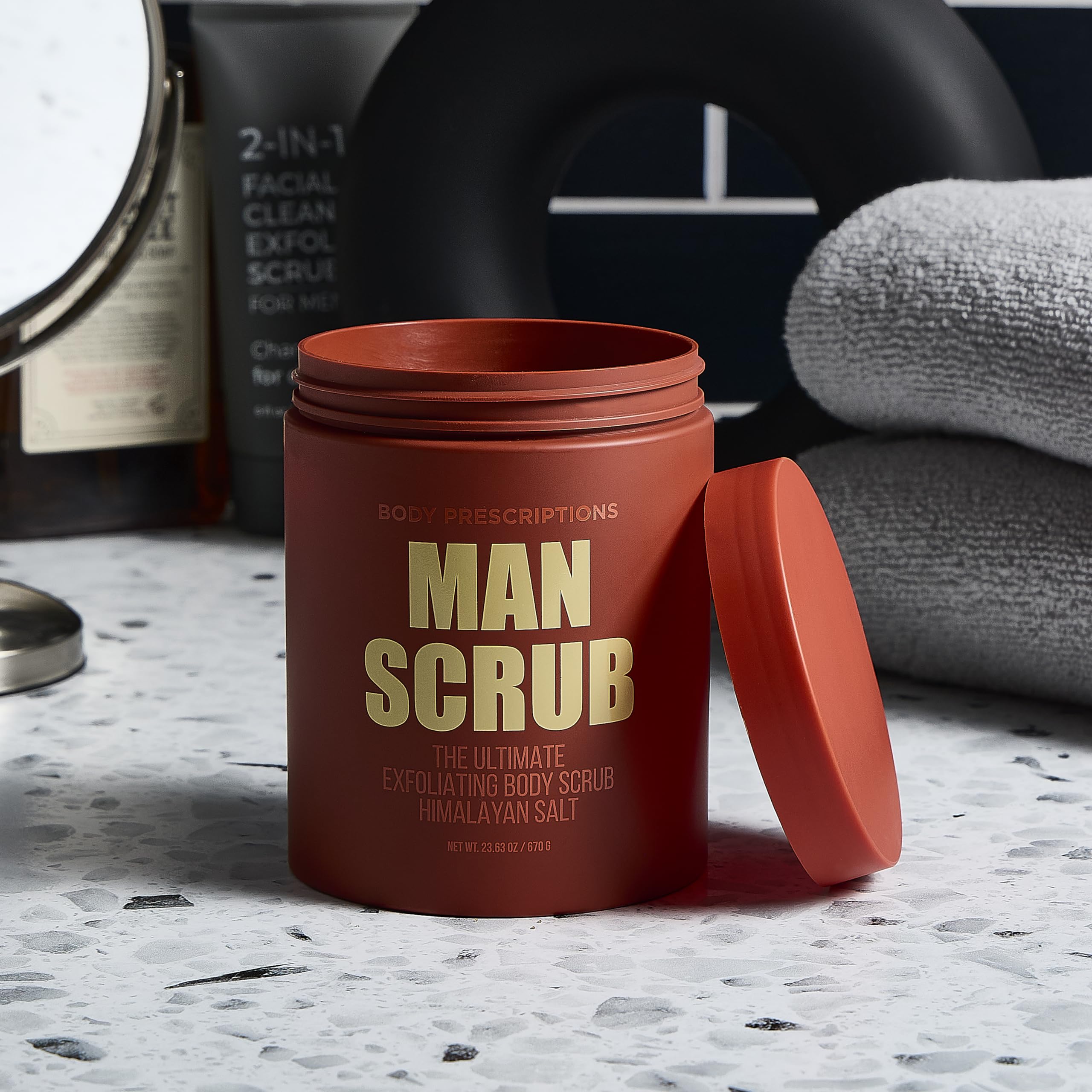 Body Prescriptions Men's Exfoliating Scrub twist-top demonstrates convenient use.