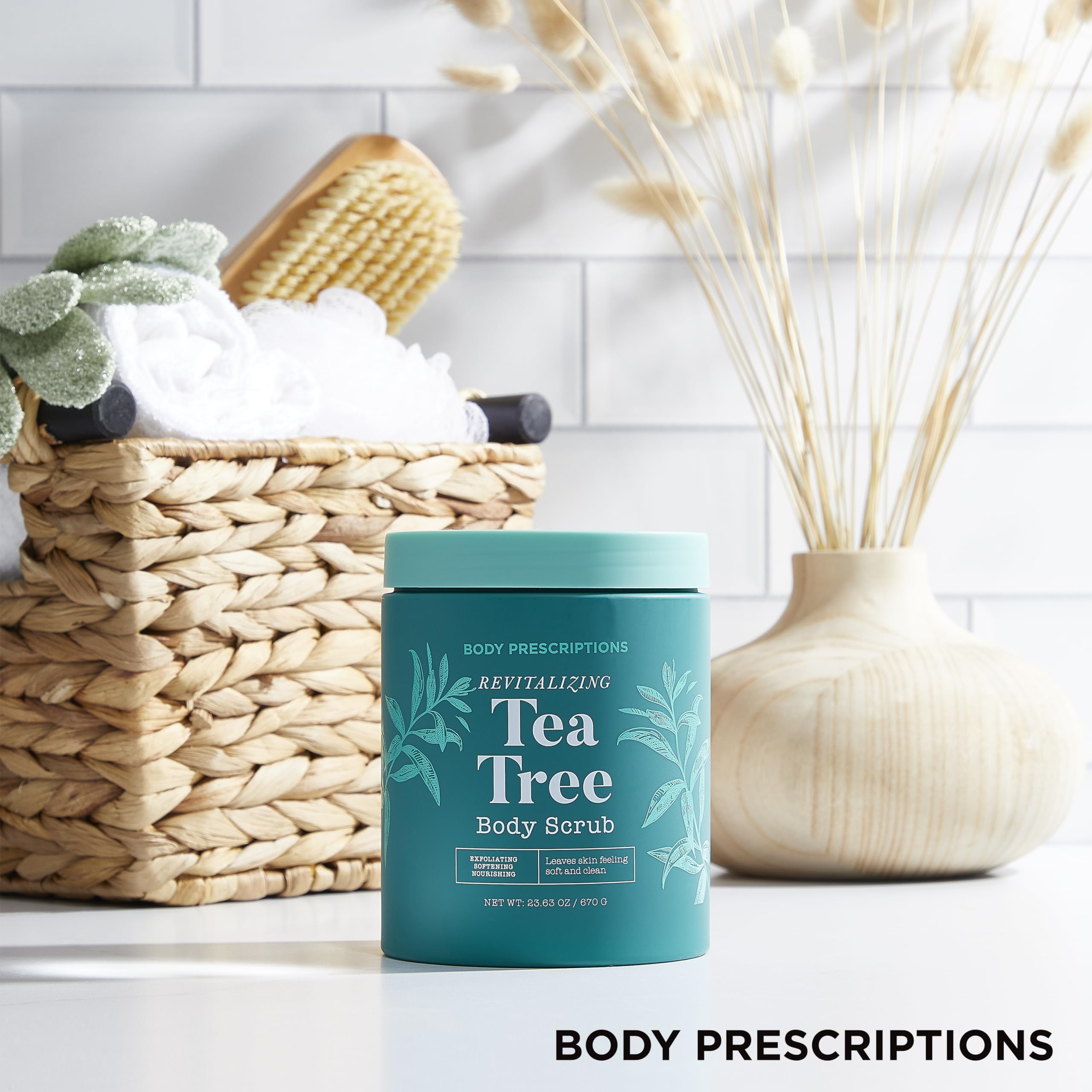 Applying Body Prescriptions Tea Tree Scrub to damp skin for a gentle body massage.
