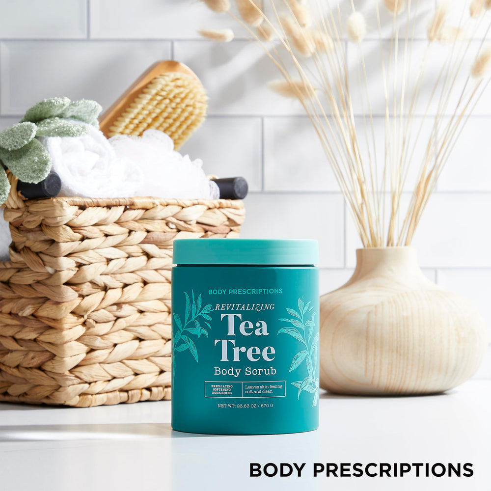 Applying Body Prescriptions Tea Tree Scrub to damp skin for a gentle body massage.
