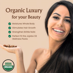 Golden jojoba oil in amber bottle ready for use.