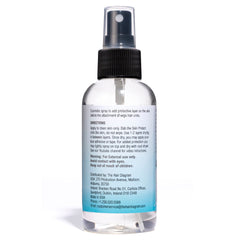 Applying Bold Hold Protect to the scalp shows even coverage and drying
