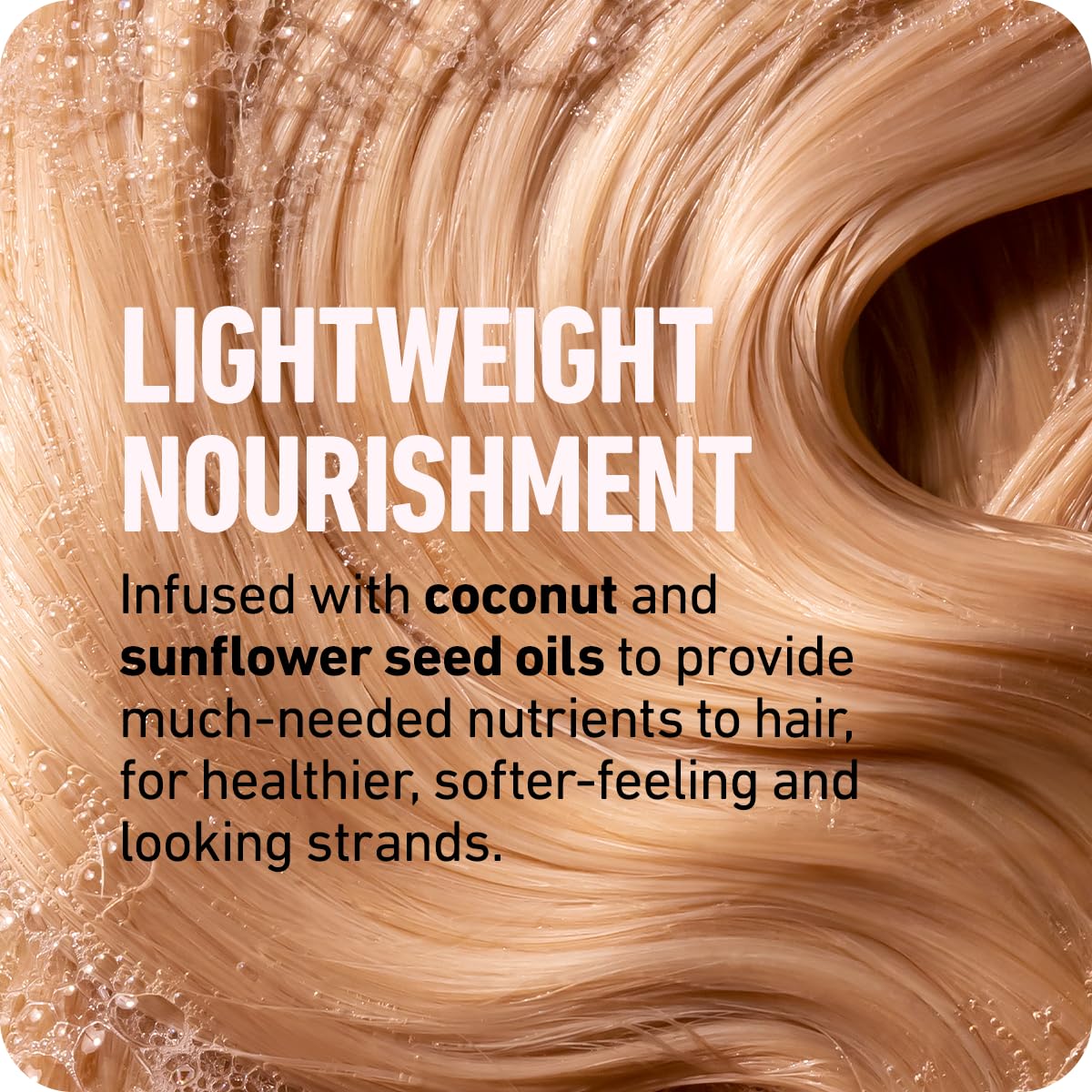 Boldify Thicken Volume Conditioner on hair shows detangling and shine benefits.