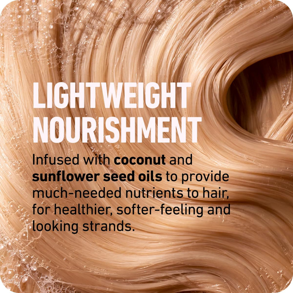 Boldify Thicken Volume Conditioner on hair shows detangling and shine benefits.