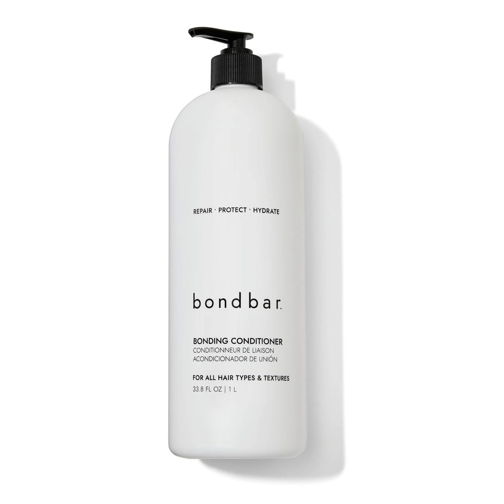 Bondbar conditioner bottle on display signaling bond repair and moisturizing protection.