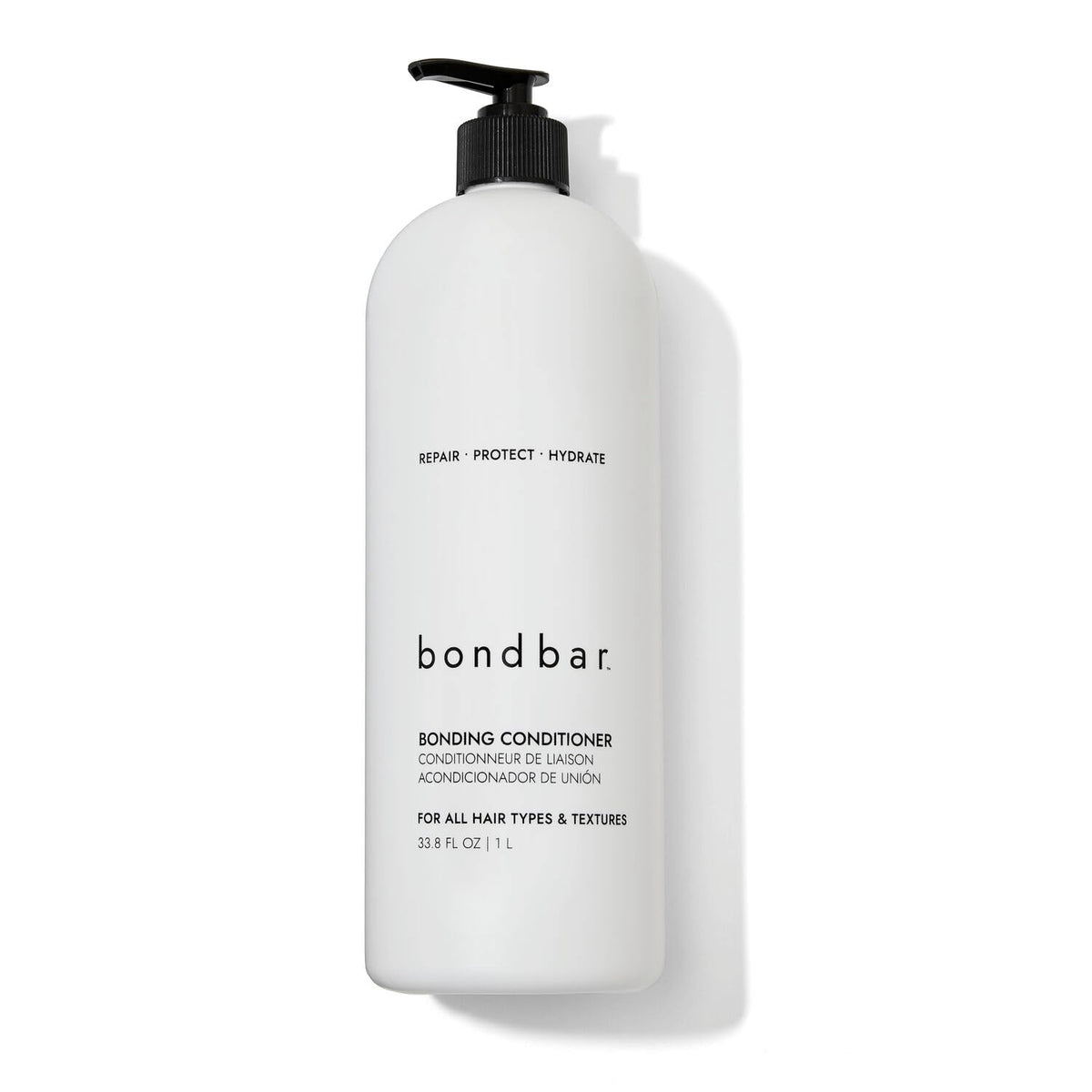 Bondbar conditioner bottle on display signaling bond repair and moisturizing protection.