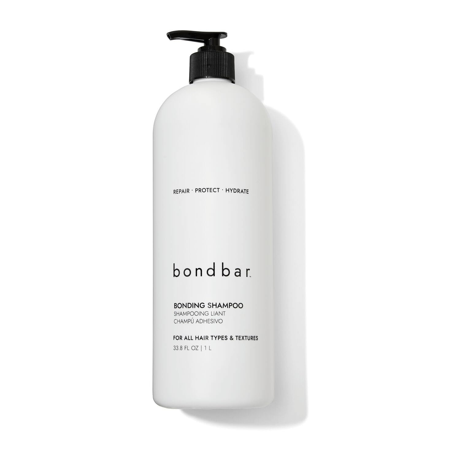 Bondbar Repairing Shampoo bottle close-up highlighting hydrating formula for all hair types.
